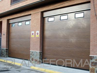 Garaje, Bodega Estilo moderno Color marron  diseñado por DICOMA ALZURIA | Gremio | Copyright Somos propietarios