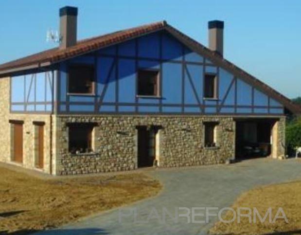 Exterior Estilo rustico Color marron, azul, marron  diseñado por asier alonso gorbalan | Reformista, constructor | Copyright Autor de la fotografía