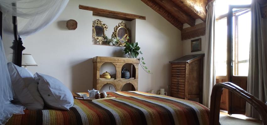 Dormitorio Estilo rustico Color rojo, ocre, marron  diseñado por RR Estudio | Arquitecto | Copyright RR Estudio