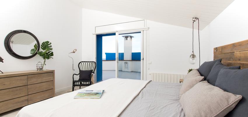 Dormitorio Estilo mediterraneo Color blanco, gris, negro  diseñado por Dröm Living | Interiorista 