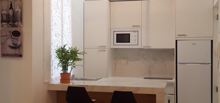 Cocina, Salon Estilo contemporaneo Color beige, gris, plateado  diseñado por estudio2interiorismo | Interiorista | Copyright estudio2interiorismo