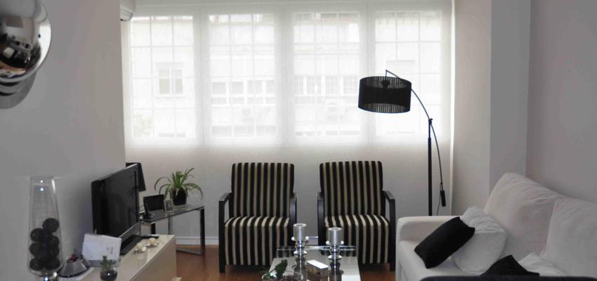 Salon style contemporaneo color beige, gris, gris  diseñado por Nuevos AYRES | Interiorista 