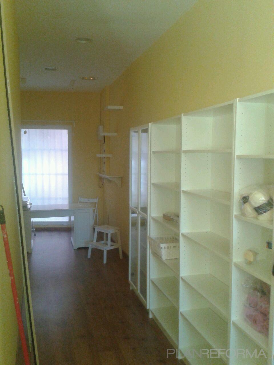 Tienda style moderno color beige, marron, blanco  diseñado por TOOLMAN | Gremio 