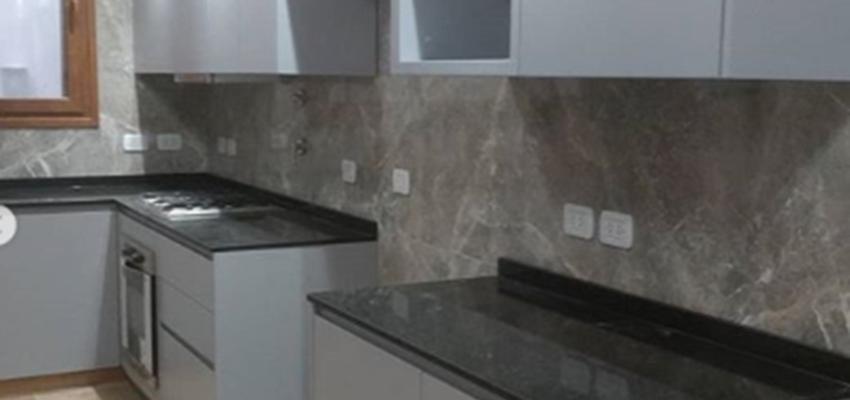 Cocina Estilo moderno Color gris, gris, plateado  diseñado por Atlantico Arqs | Arquitecto | Copyright www.atlanticoarqs.com