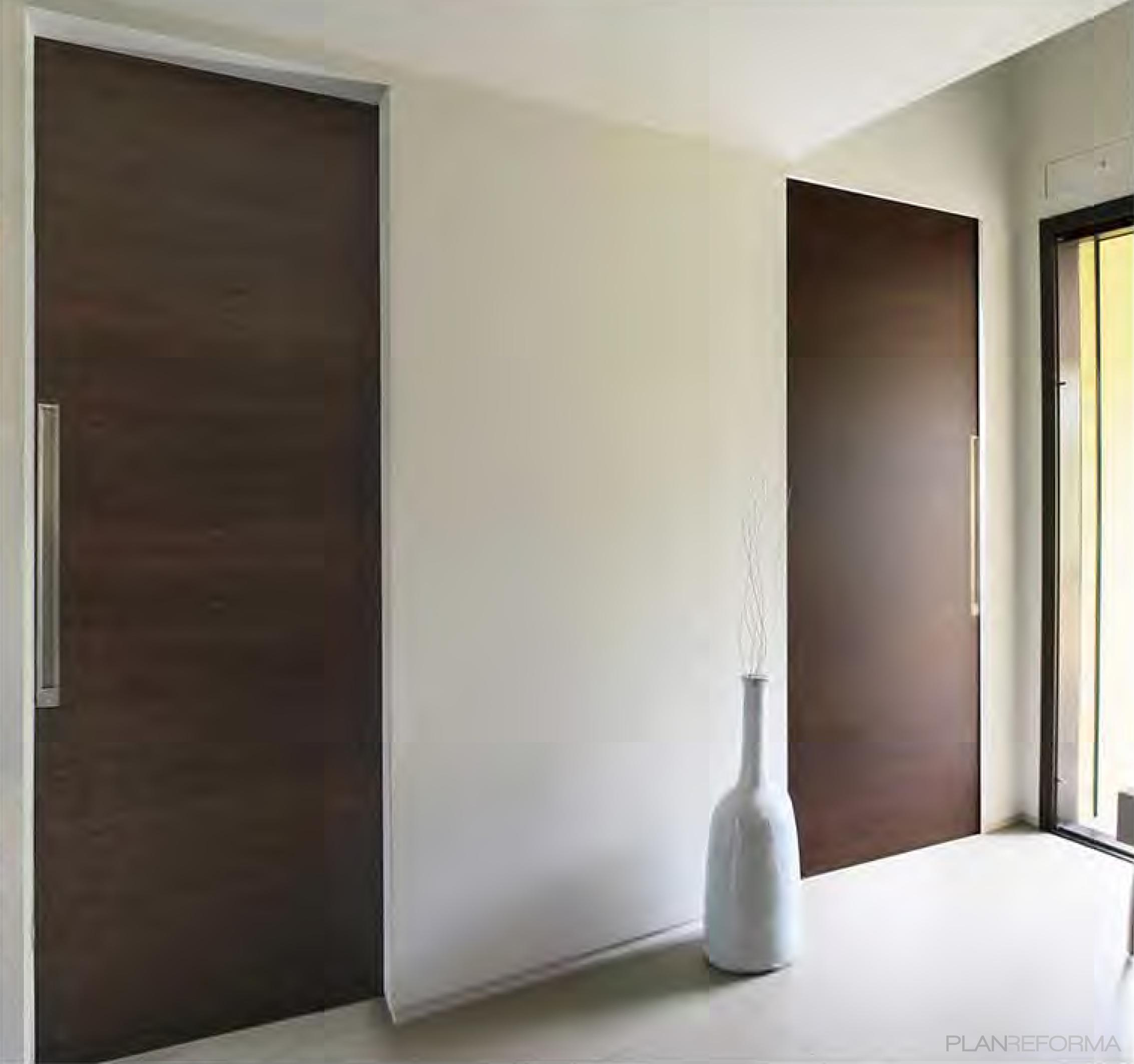 Recibidor Estilo contemporaneo Color marron, blanco, gris  diseñado por Oficina Urbana | Arquitecto 