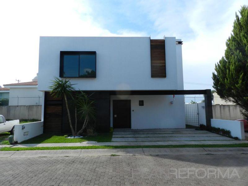Exterior style moderno color marron, gris  diseñado por ATIKO | Arquitecto | Copyright .