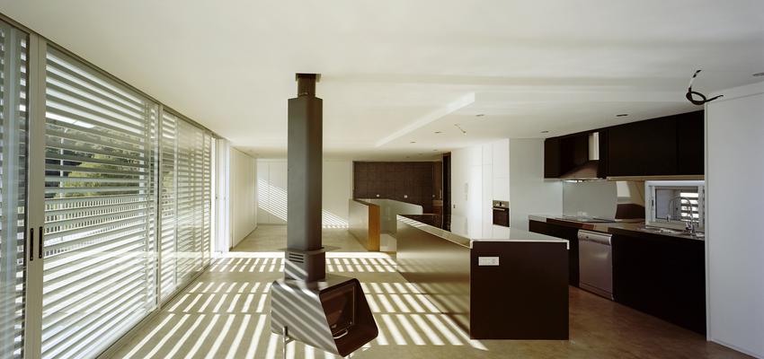 Cocina, Loft style moderno color marron, blanco, gris, negro  diseñado por encajes de arquitectura | Arquitecto 
