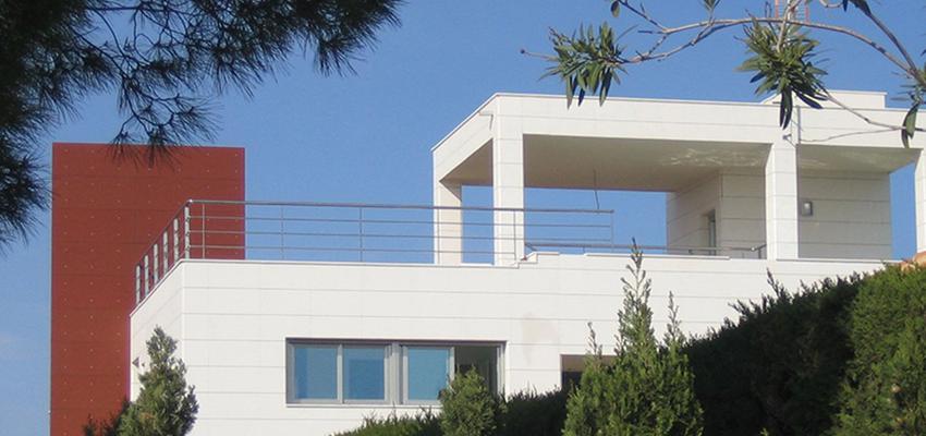 Exterior style moderno color rojo, blanco  diseñado por Unestudio | Arquitecto 