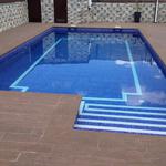 Exterior style contemporaneo color azul, marron, gris