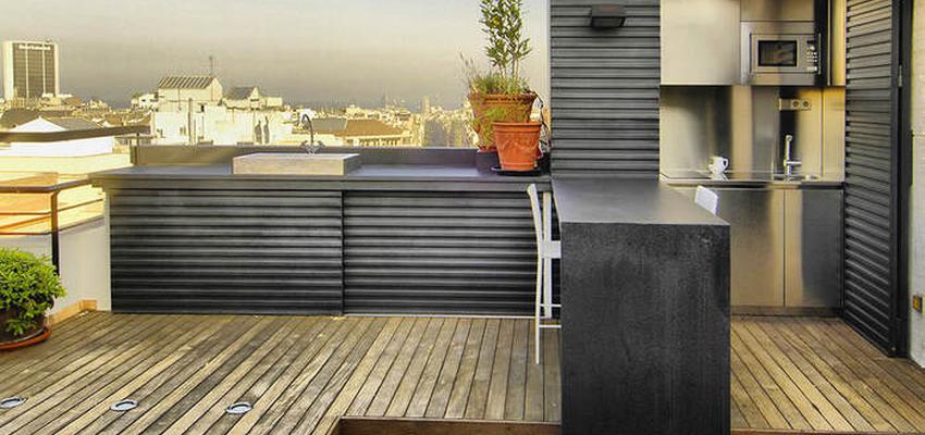 Terraza Estilo rustico Color marron, gris, negro  diseñado por Serveis Generals. JW | Gremio 