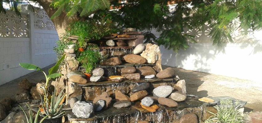 Exterior Estilo tropical Color verde  diseñado por Gstecnica | Gremio | Copyright GStecnicacb