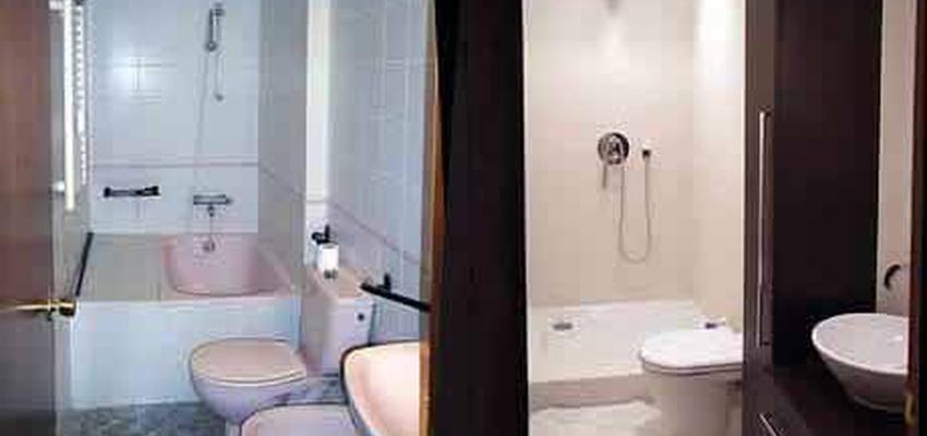 Baño style moderno color ocre, azul, marron  diseñado por GESPROCÓN_ARQUITECTURA E INGENIERÍA | Arquitecto Técnico 