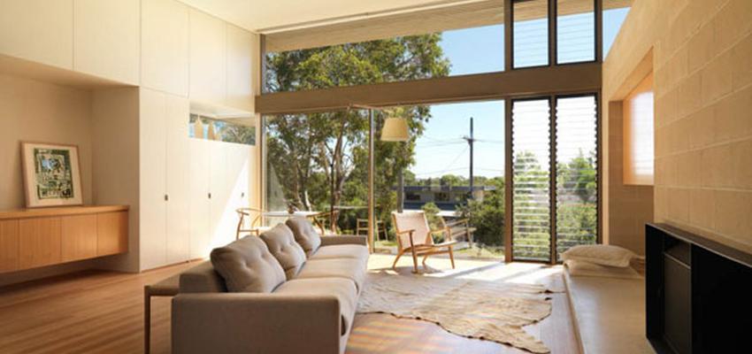 Salon style moderno color beige, marron  diseñado por ARQUIMADER construcción en madera | Arquitecto 