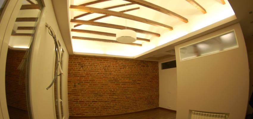 Salon Estilo vanguardista Color amarillo, marron, marron, blanco  diseñado por GEODA ARQUITECTURA | Gremio 