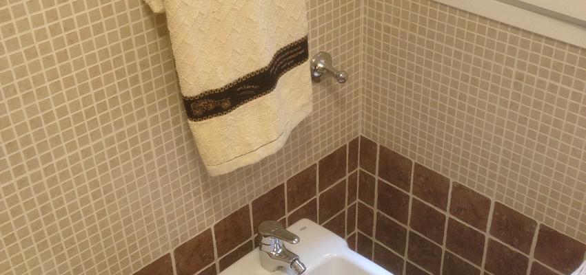 Baño Estilo moderno Color marron  diseñado por Taziken Obras y Servicios | Gremio | Copyright Taziken Iberica, SL