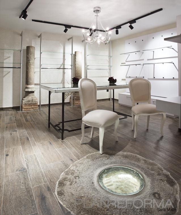 Tienda style eclectico color beige, marron, beige, blanco  diseñado por MACOR | Arquitecto | Copyright Sara Mate