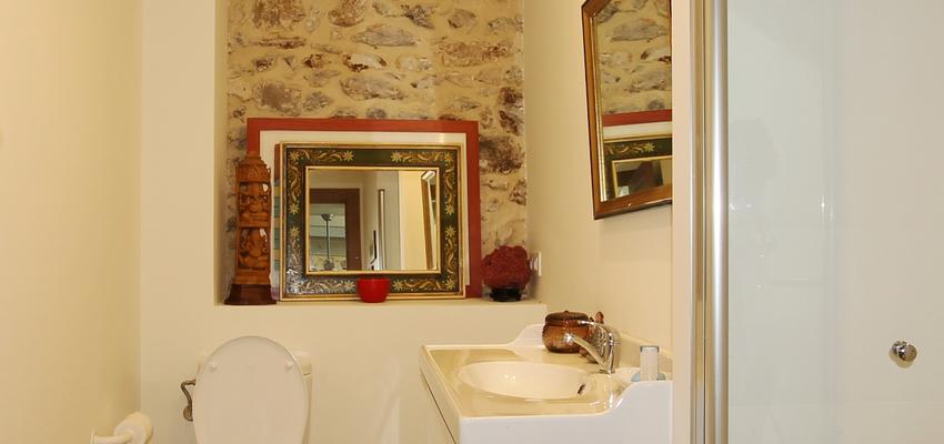 Baño Estilo rustico Color rojo, marron, marron  diseñado por BR&C arquitectos | Arquitecto 