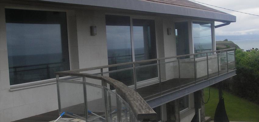 Terraza, Exterior Estilo contemporaneo Color marron, blanco, negro  diseñado por BR&C arquitectos | Arquitecto 