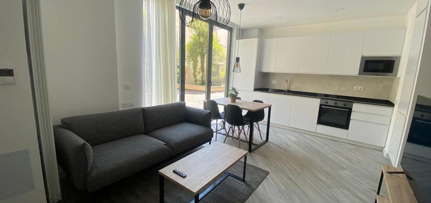 Loft Estilo moderno Color beige, blanco, gris  diseñado por Métricâ Zero | Reformista, constructor 