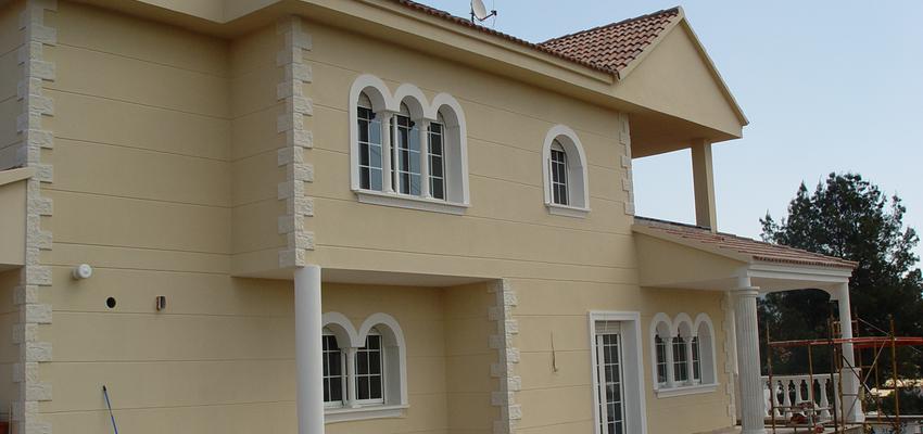 Exterior Estilo clasico Color amarillo, plateado  diseñado por Servifachadas | Gremio | Copyright Julián Osorio Lozano