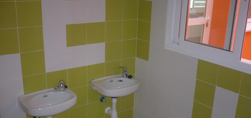 Baño Estilo moderno Color verde, blanco  diseñado por Marco A. Domínguez | Gremio 