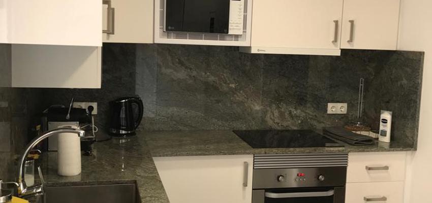 Cocina Estilo moderno Color marron, blanco, gris  diseñado por Refomas Barcelona Rubio | Gremio | Copyright Reformas Barcelona Rubio