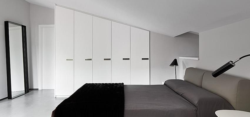 Dormitorio Estilo contemporaneo Color marron, blanco, gris  diseñado por Jordi Sagalés | Arquitecto 