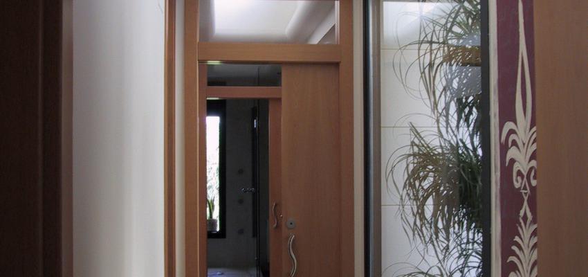 Recibidor, Pasillo Estilo contemporaneo Color marron, blanco  diseñado por ARQuadrat - arquitectura i rehabilitació | Arquitecto Técnico 