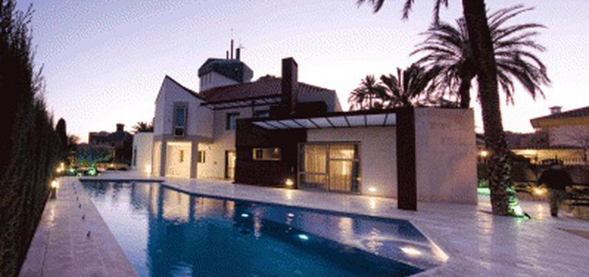 Exterior style contemporaneo color azul, beige, negro  diseñado por NC Arquitectura | Arquitecto 