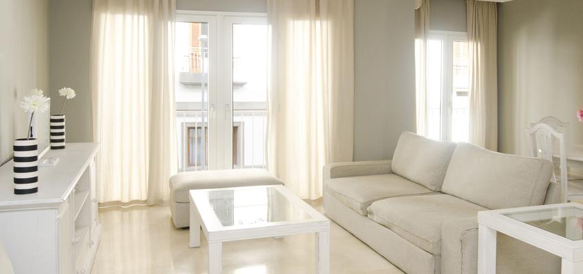 Salon Estilo tradicional Color beige, blanco, gris  diseñado por Mirmen Arquitectura - Interiorismo - Reformas | Arquitecto | Copyright Propietario