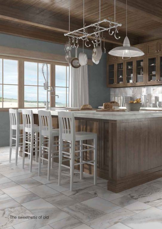 Cocina style rustico color azul cielo, marron, blanco  diseñado por keraben | Marca colaboradora | Copyright Keraben